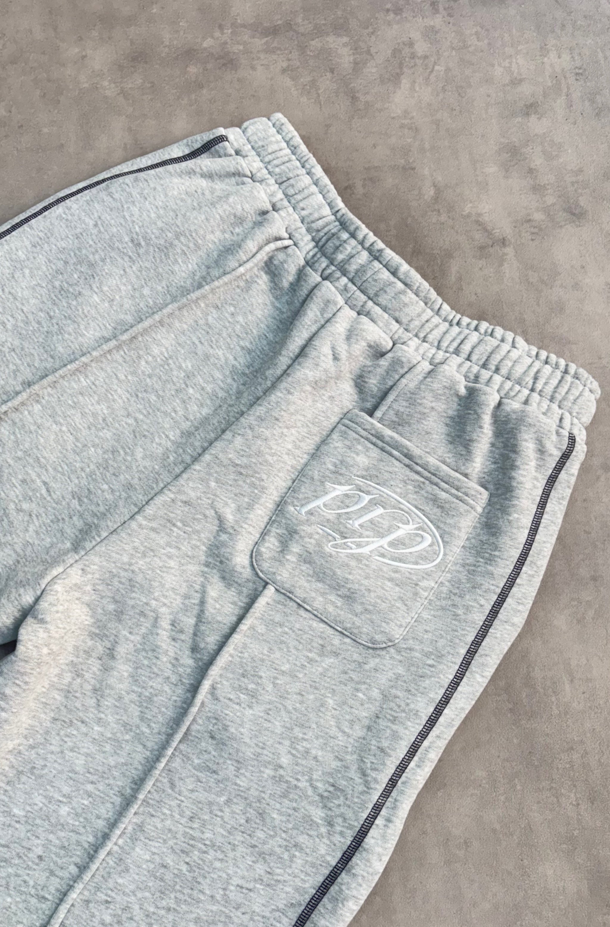 OVERSIZED GREY JORTS - Purple Place